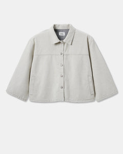 Veste oversize en denim non teint granit clair, coupe droite avec col classique et boutons devant, matière 100 % coton confortable et respirante.