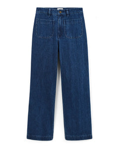 Jean en denim 100 % coton bleu foncé, coupe droite et large, avec poches plaquées sur l'avant pour femme, offrant un confort adapté à toutes les morphologies.