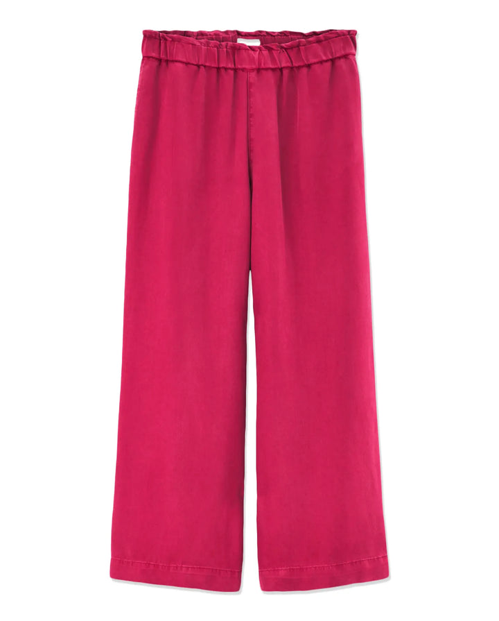 Pantalon femme en tencel rouge cerise, coupe large et fluide avec taille élastiquée pour un confort optimal et un style décontracté.