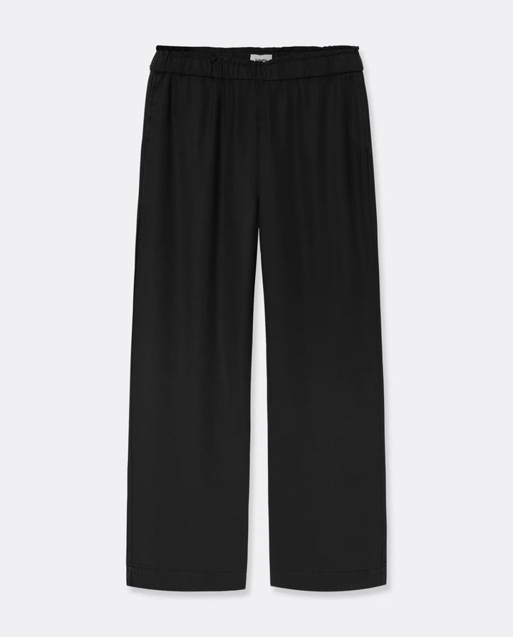 Pantalon noir en tissu fluide Tencel, coupe large et droite, taille élastiquée pour un confort adapté à toutes les morphologies féminines.