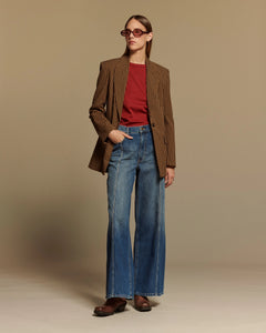 Jean large en denim 100% coton bleu moyen avec coupe droite, taille moyenne, offrant un style fluide et confortable, idéal pour toutes les morphologies féminines.